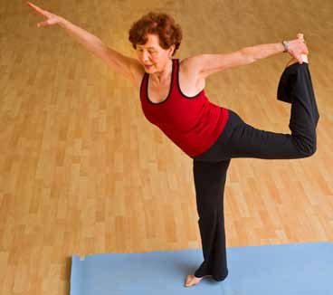 A woman holding a balance pose