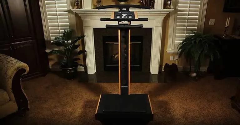 A LifetimeVibe machine in a living room by the fireplace