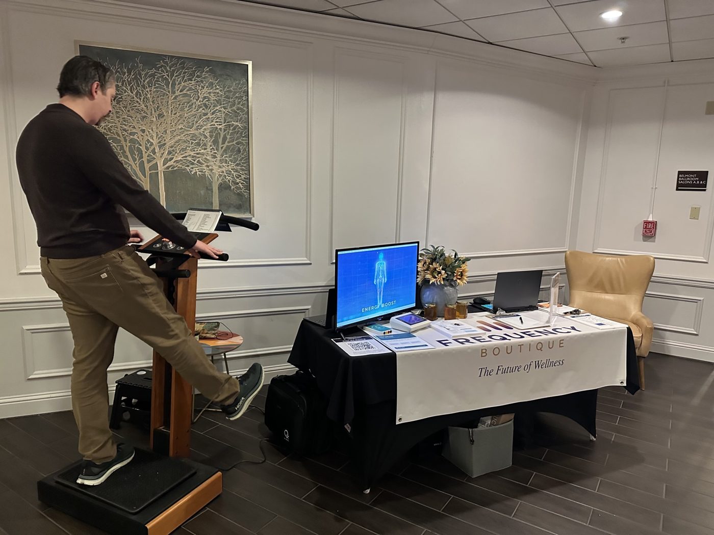 Geoff Belleville exercising on a LifetimeVibe at The Frequency Boutique booth